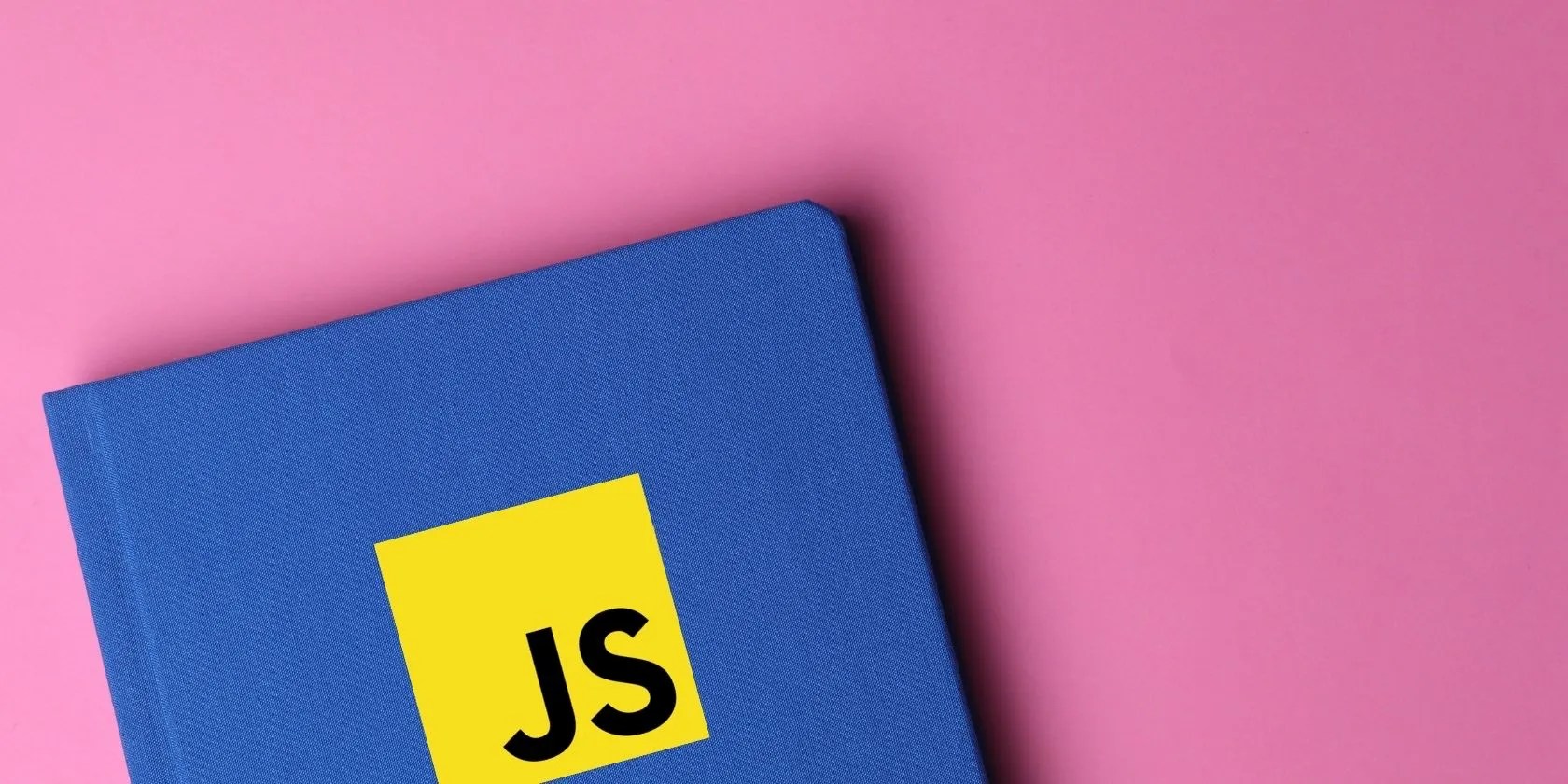 JavaScript logo on top of book