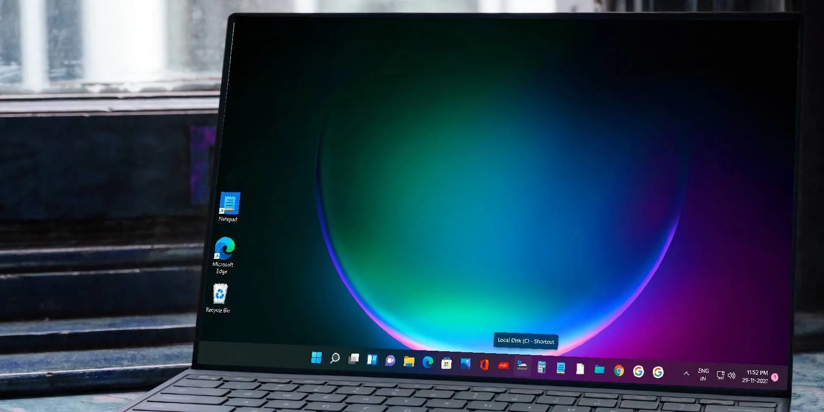 Windows 11 Laptop with Apps Pinned to Taskbar