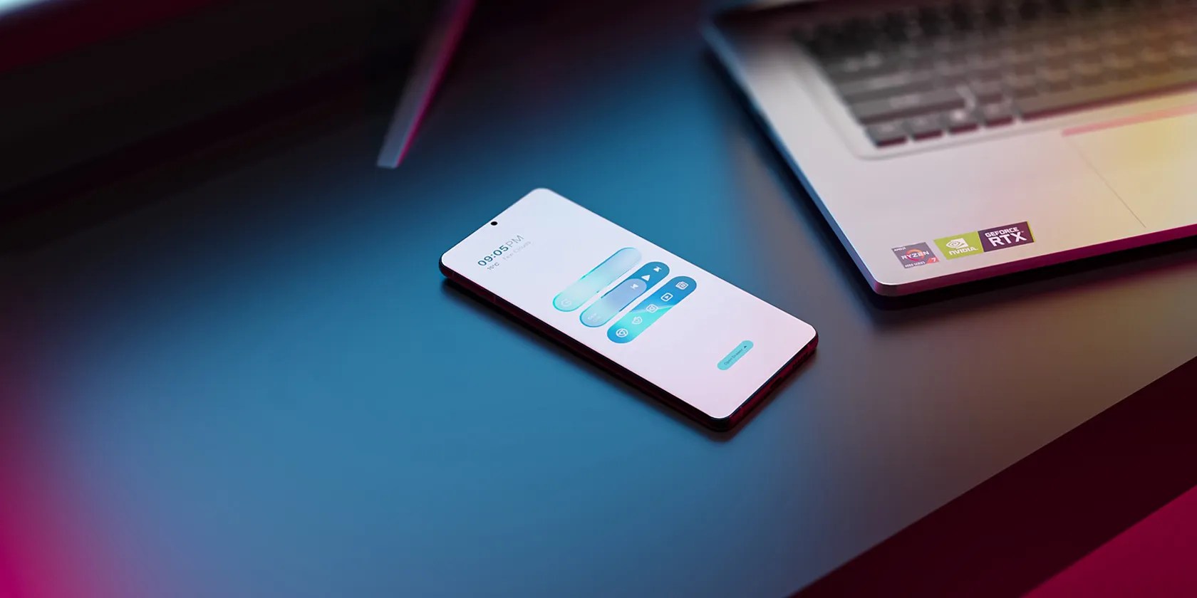 Android phone on table next to a laptop
