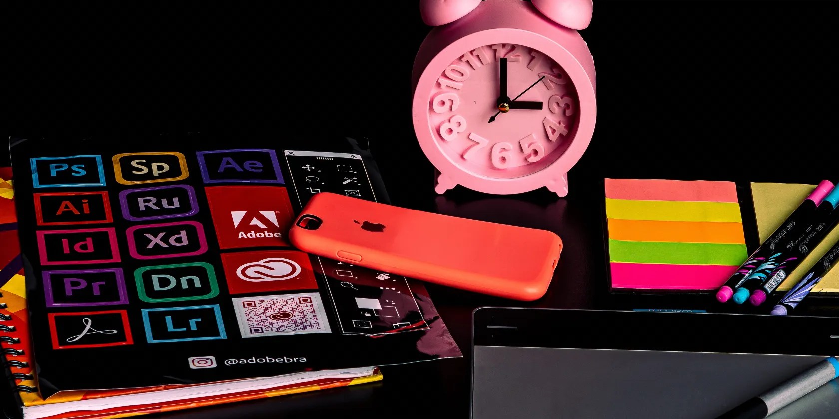 photo showing adobe logos on paper