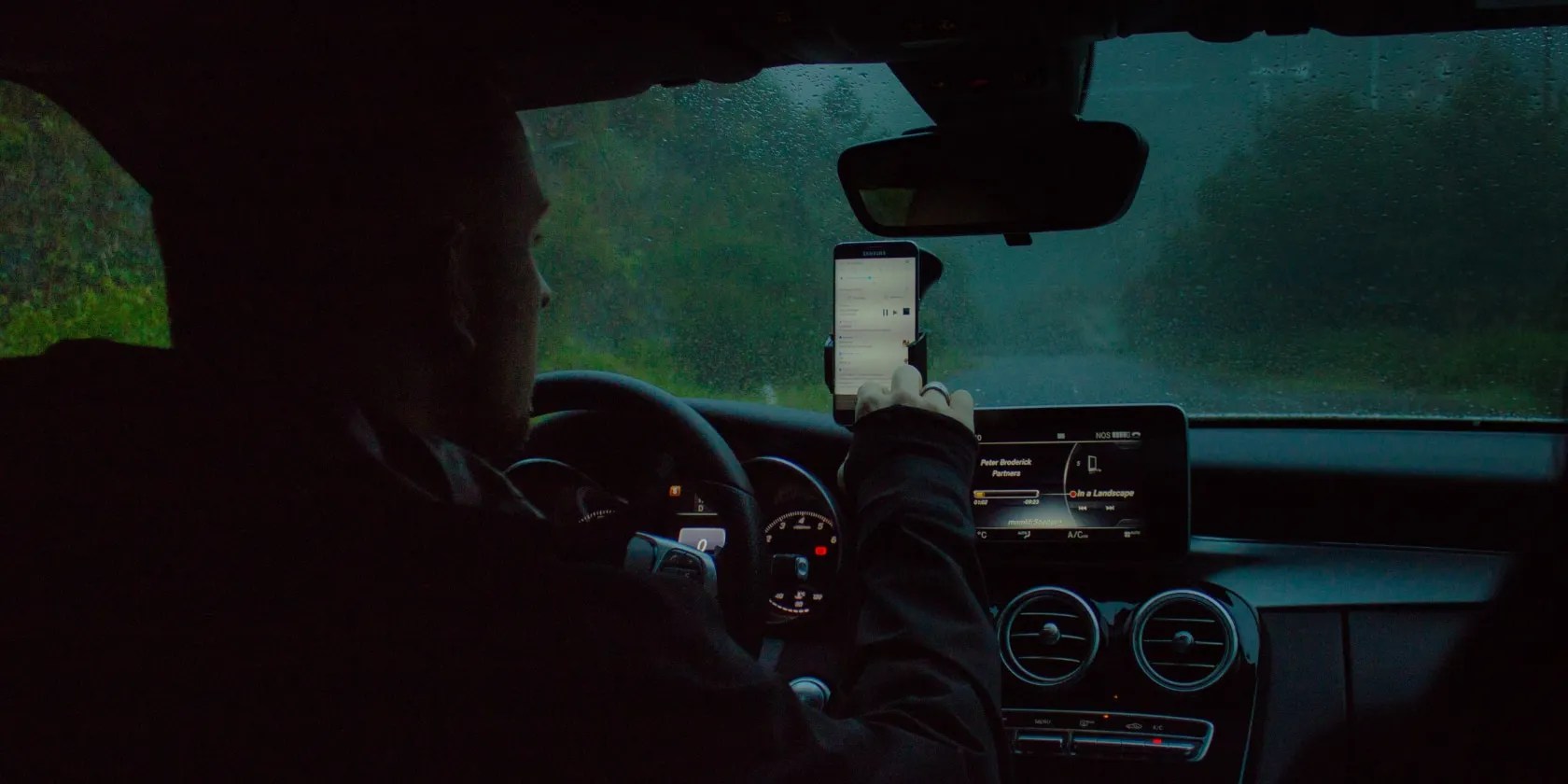 man using phone for navigation