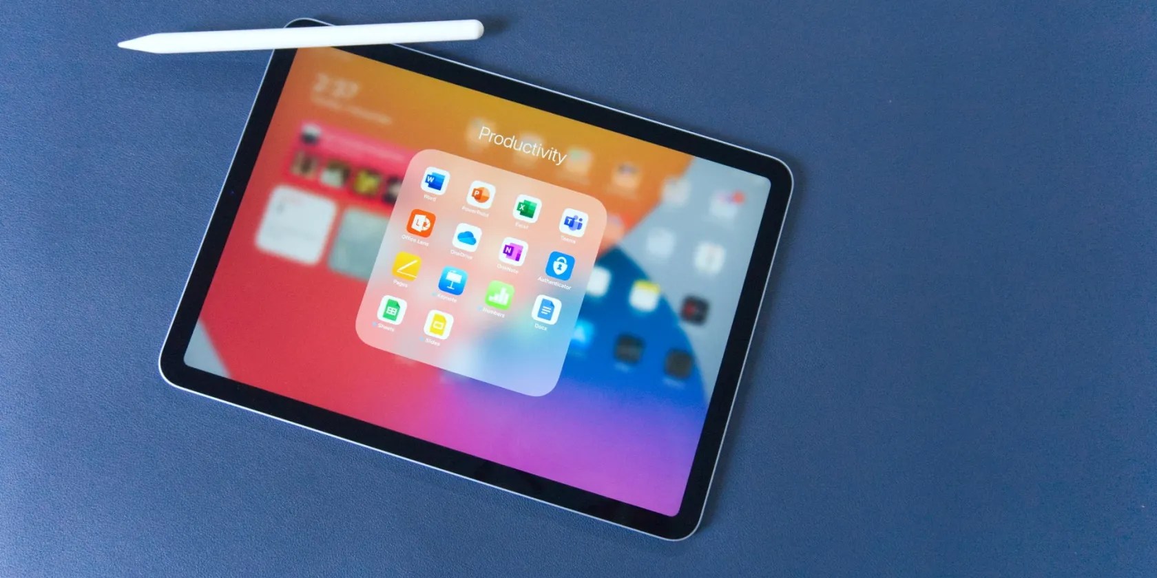 An iPad and the Apple Pencil lying on a flat surface