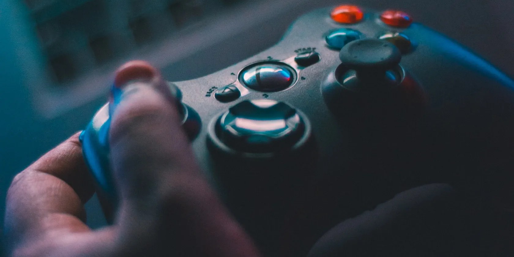 Someone holding an XBox gaming controller