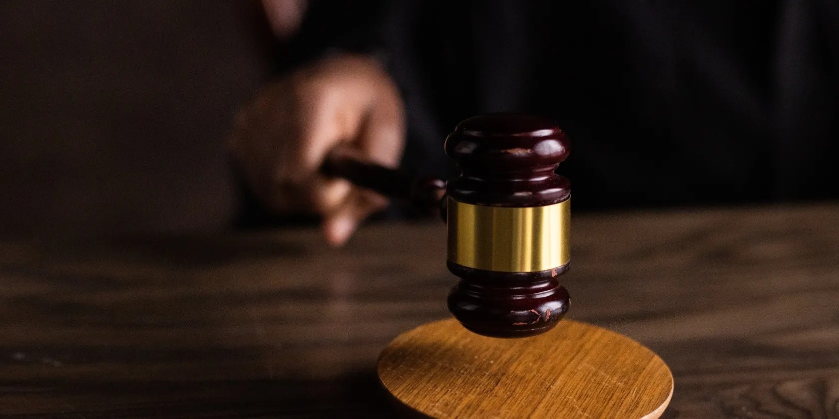 wooden gavel on table