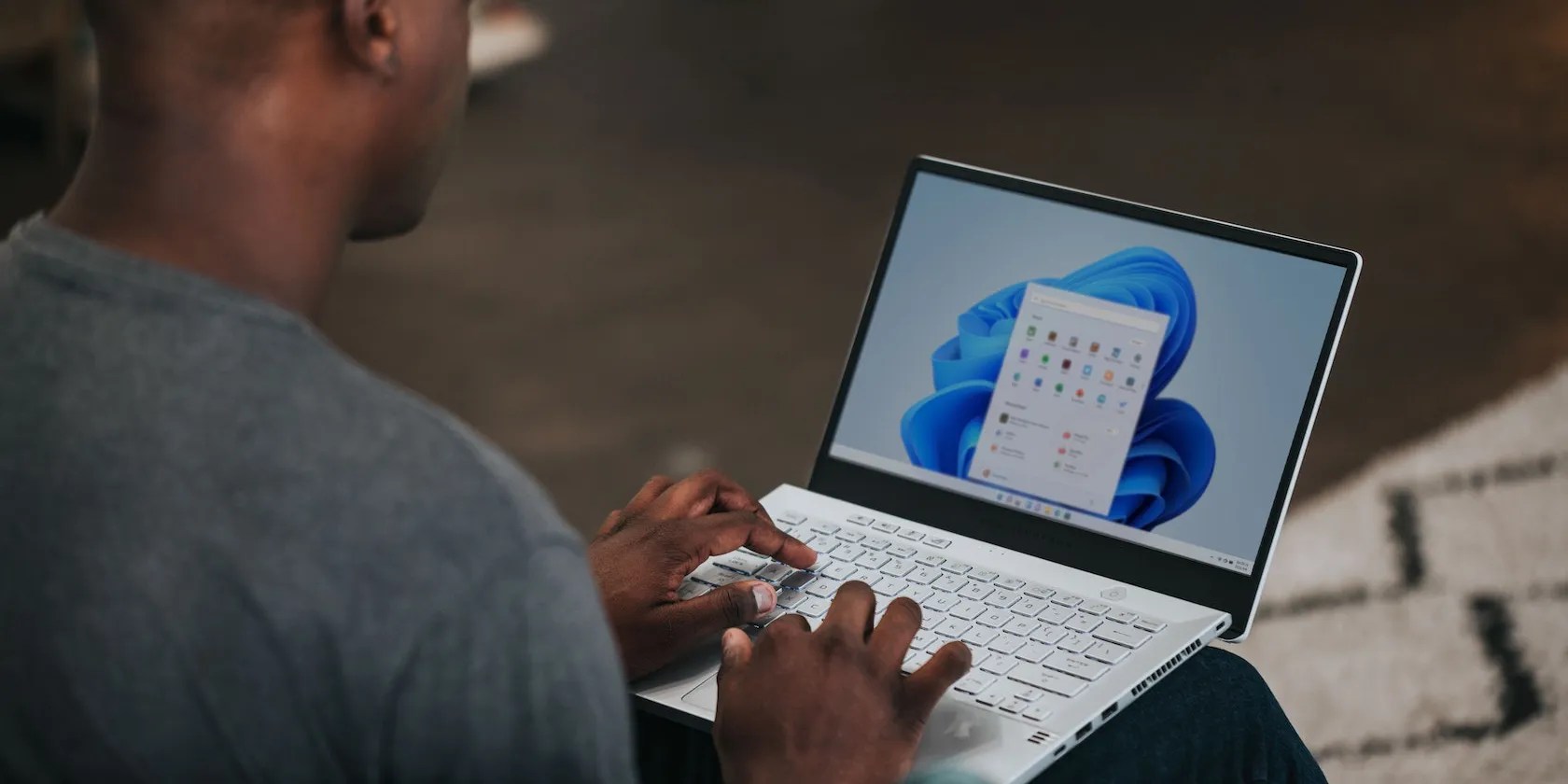 man using windows 11 laptop