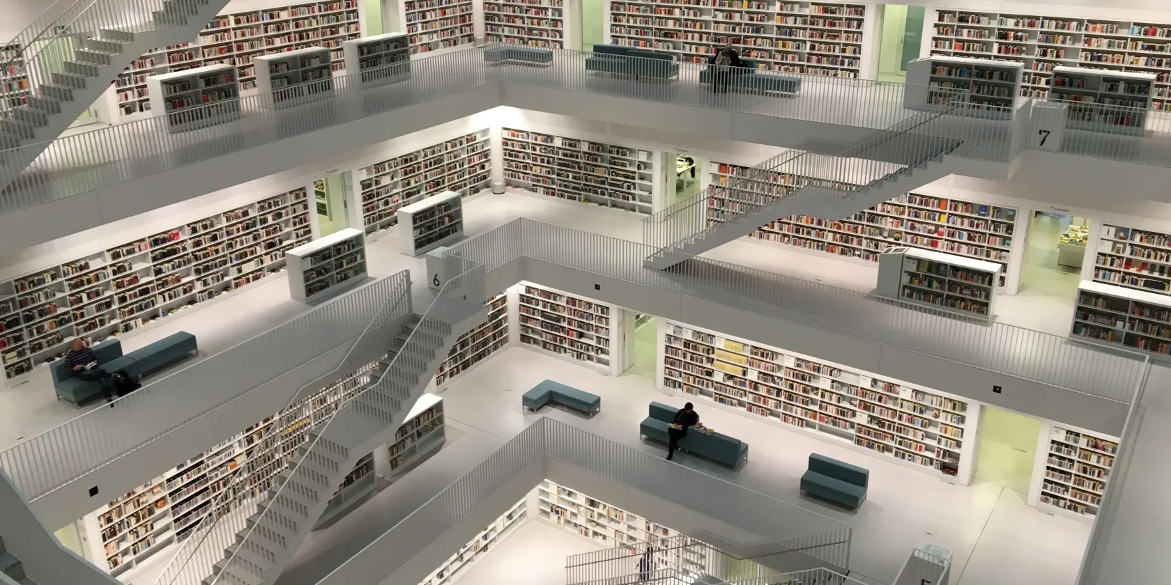 Large library with lots of books on bookshelves