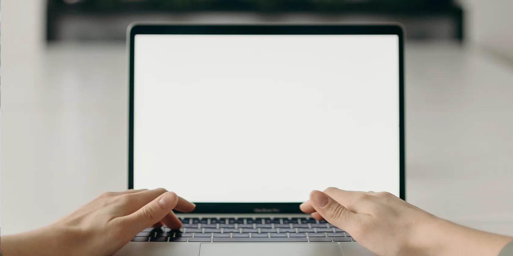Person’s hands on an Apple Silicon MacBook