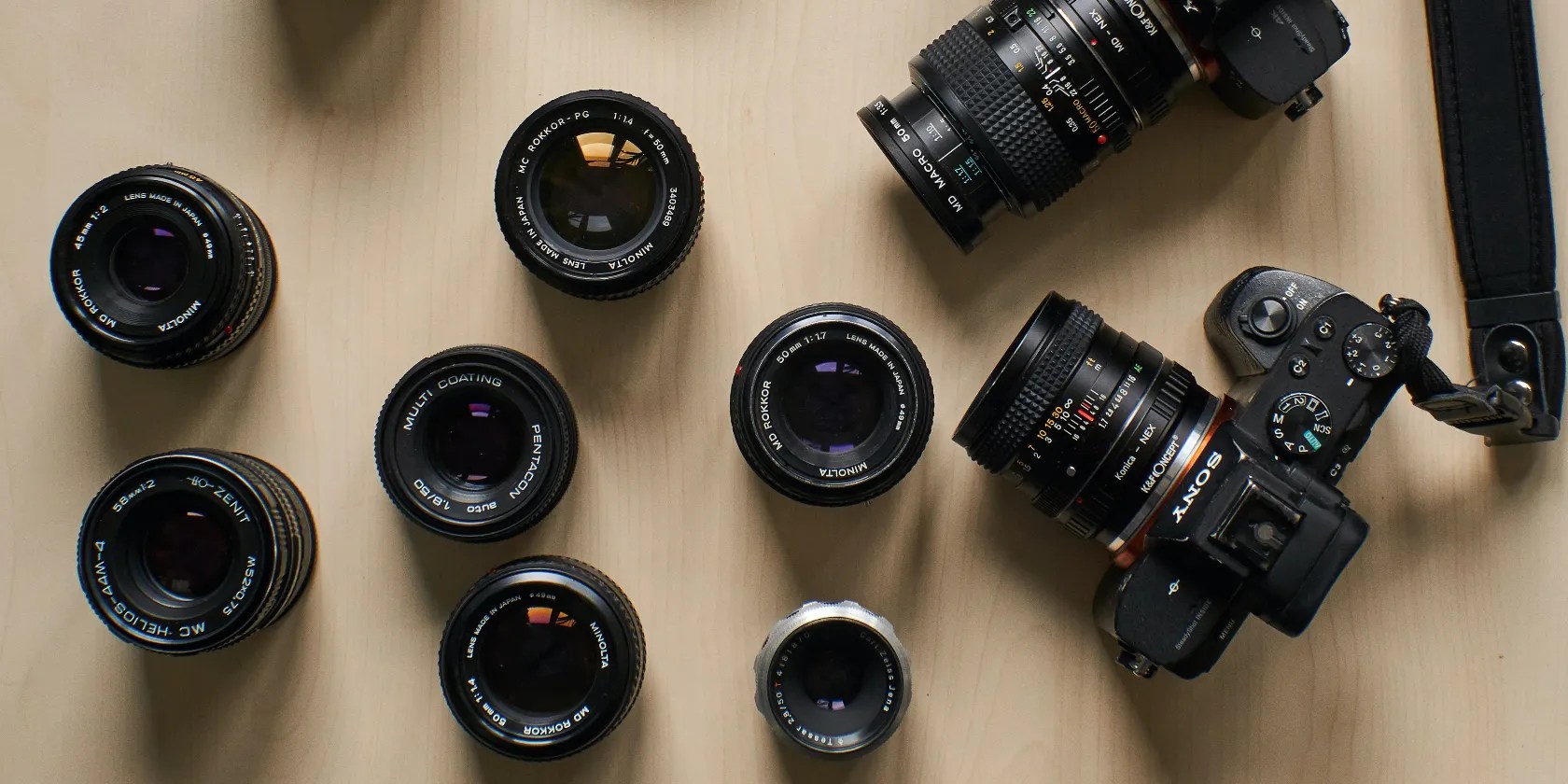 photo of camera lenses on a table