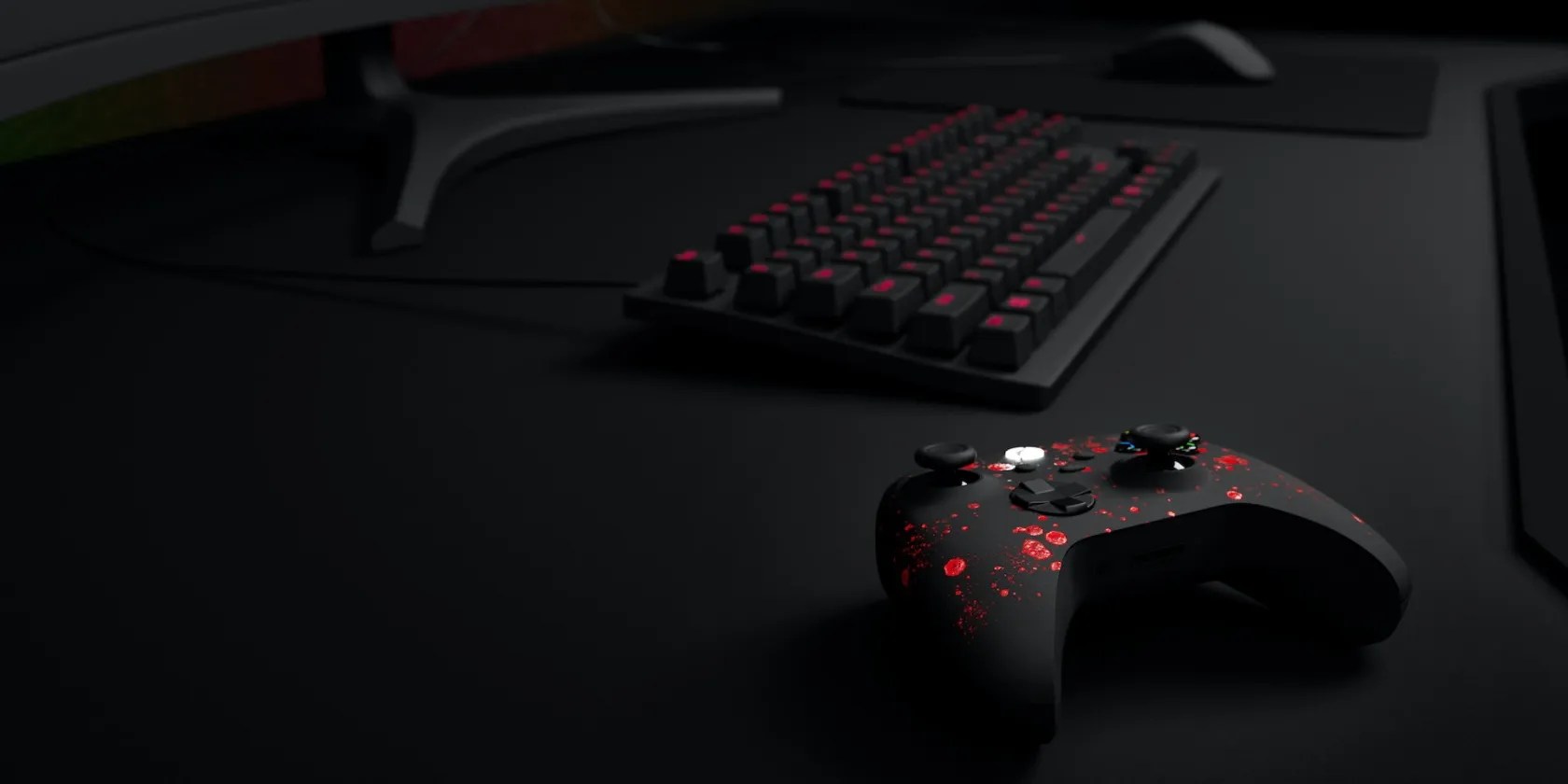 photo of controller and keyboard on a desk