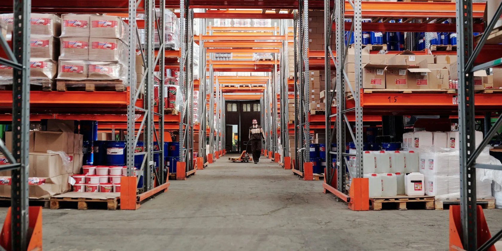 Huge shelves in a warehouse stacked with large boxed items