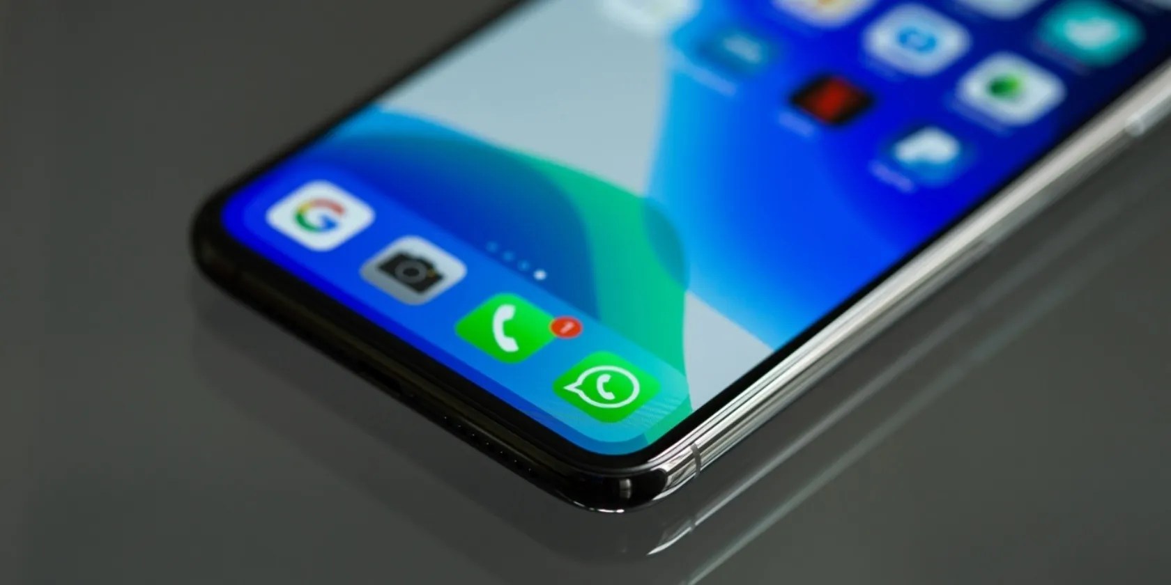 whatsapp logo on corner of mobile phone screen