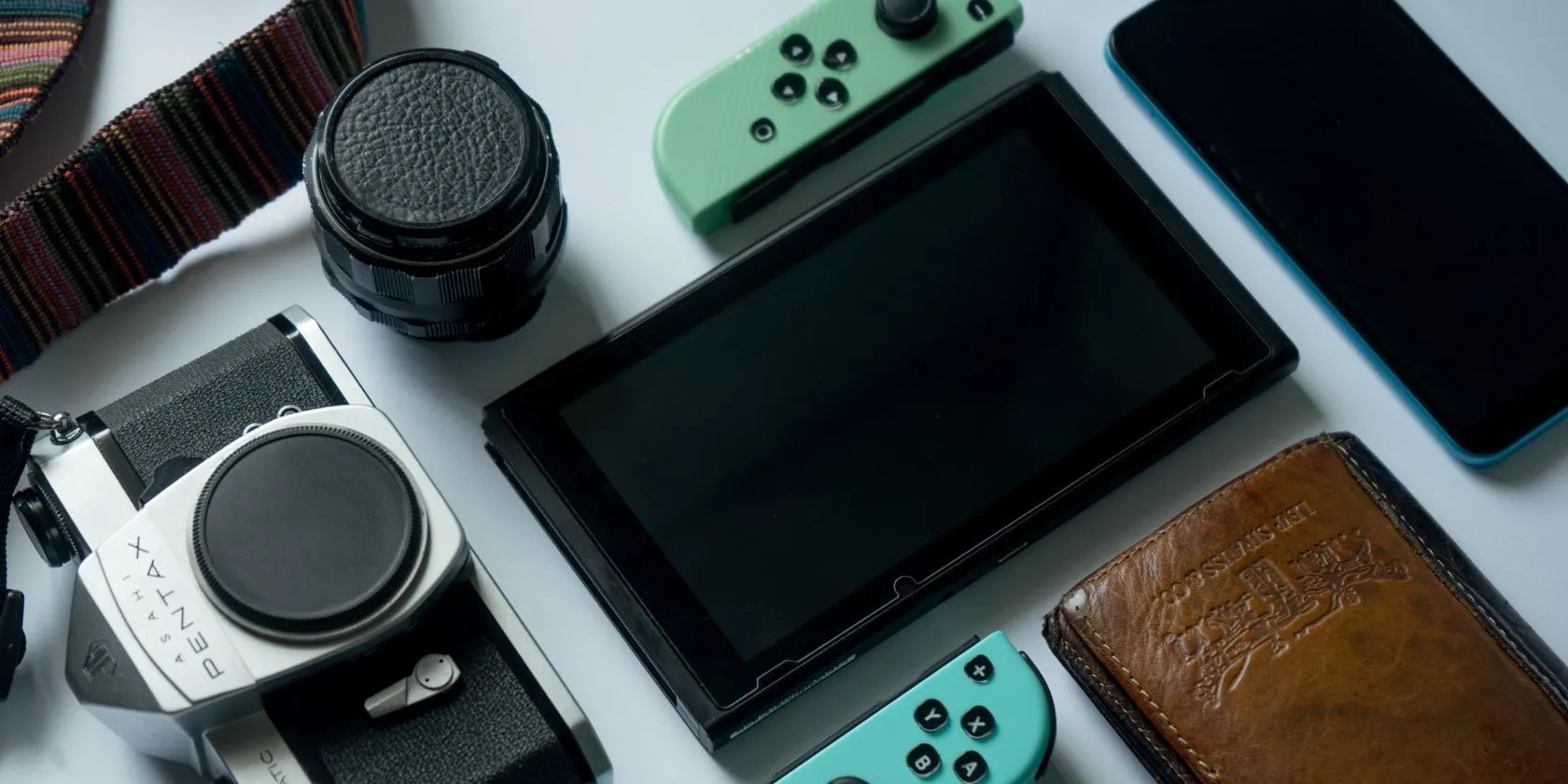Close up of flatlay with nintendo switch and gadgets