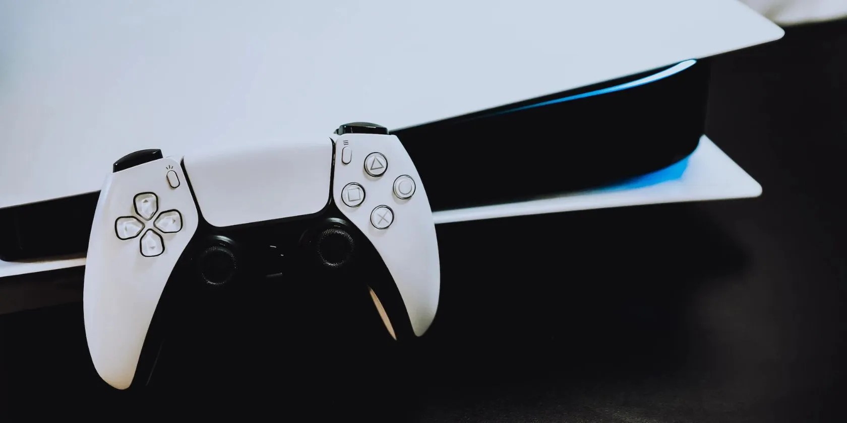 Close up of PlayStation 5 console and controller