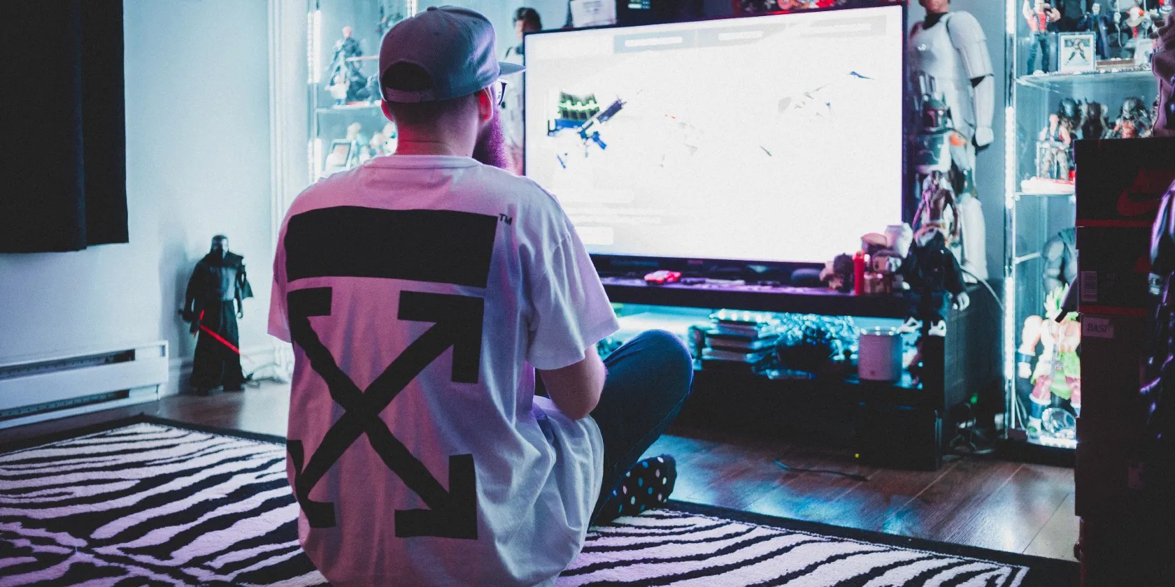 Man playing a game on a tv console