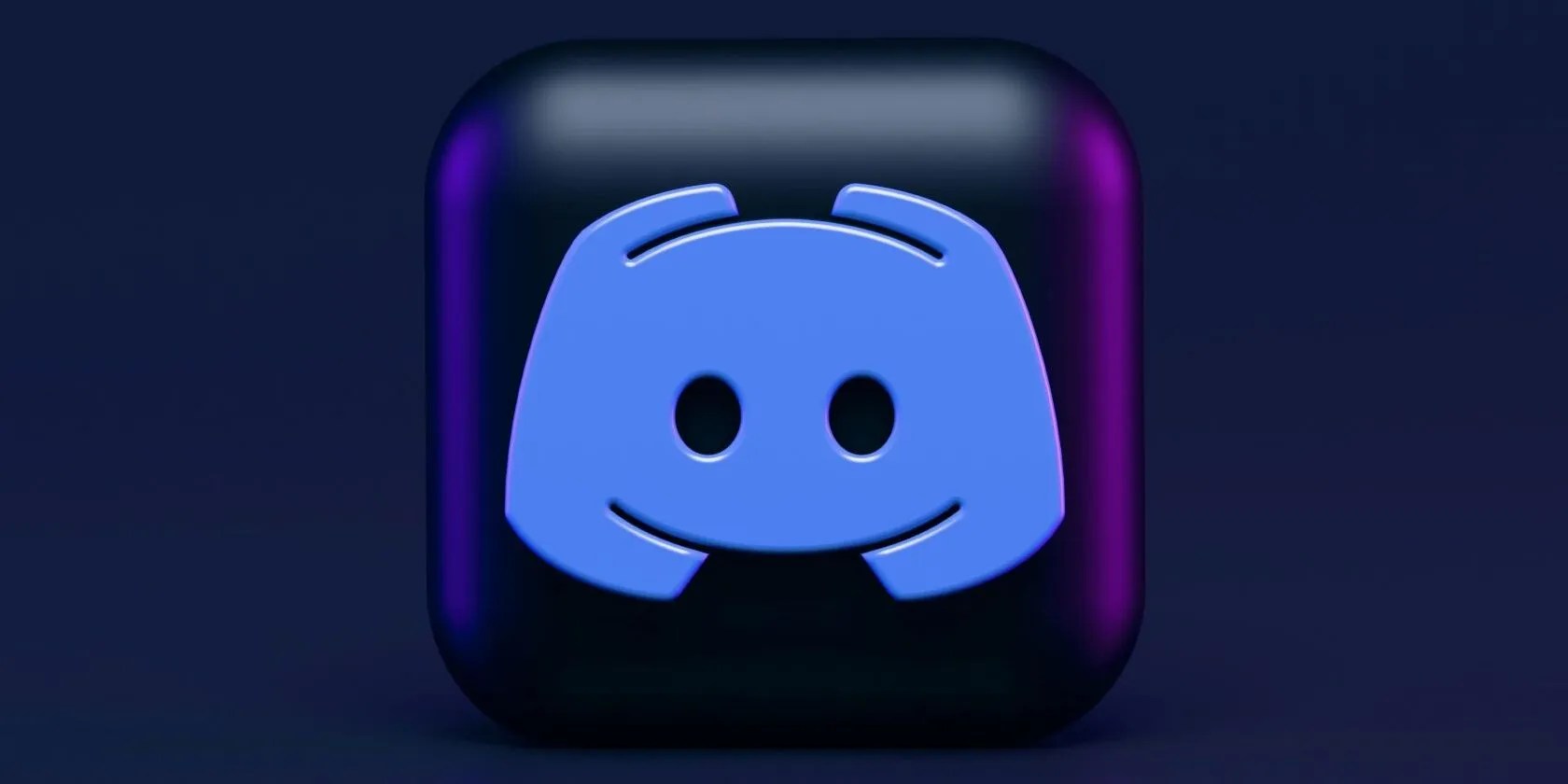 An image of the Discord logo on a black tablet
