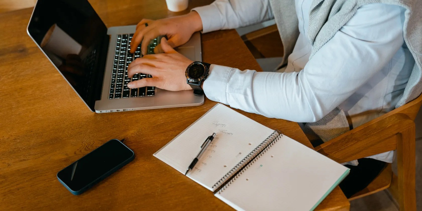 Male Hands Typing on MacBook