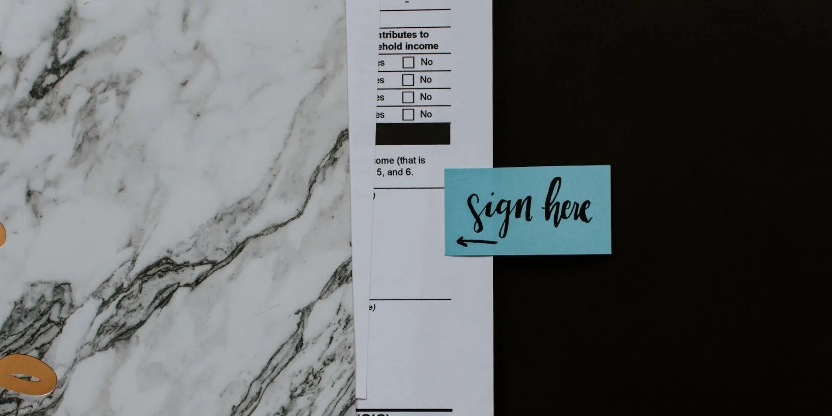 form with a “sign here” sign