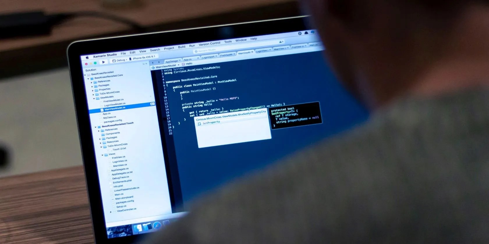 Laptop displaying a Java class