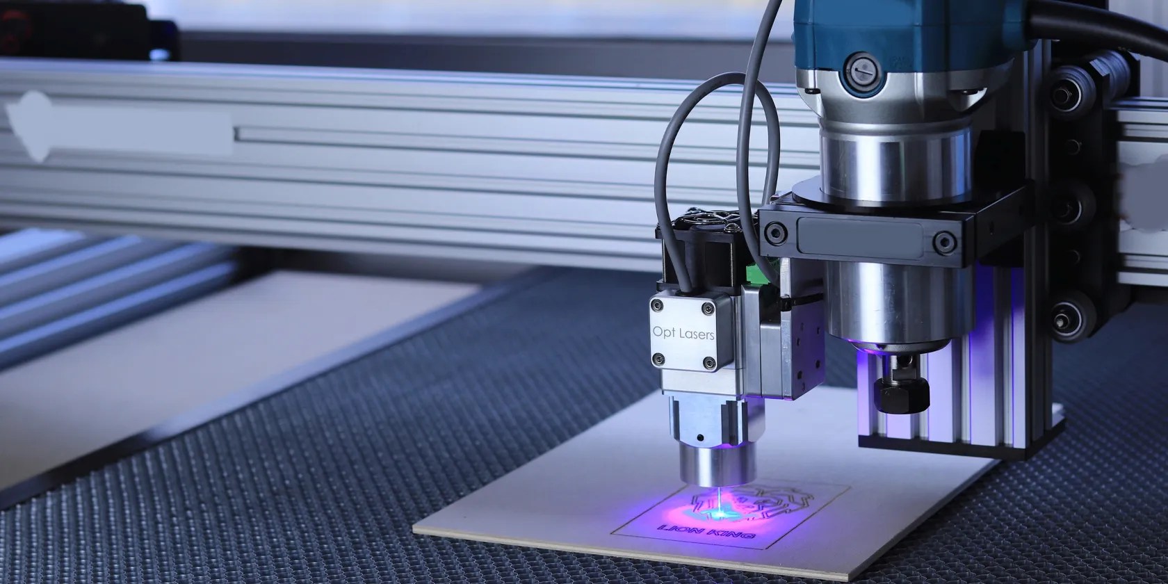 A laser cutter being used to cut a material
