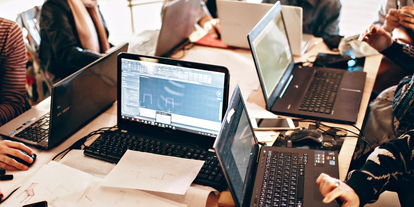 networked laptops on a table