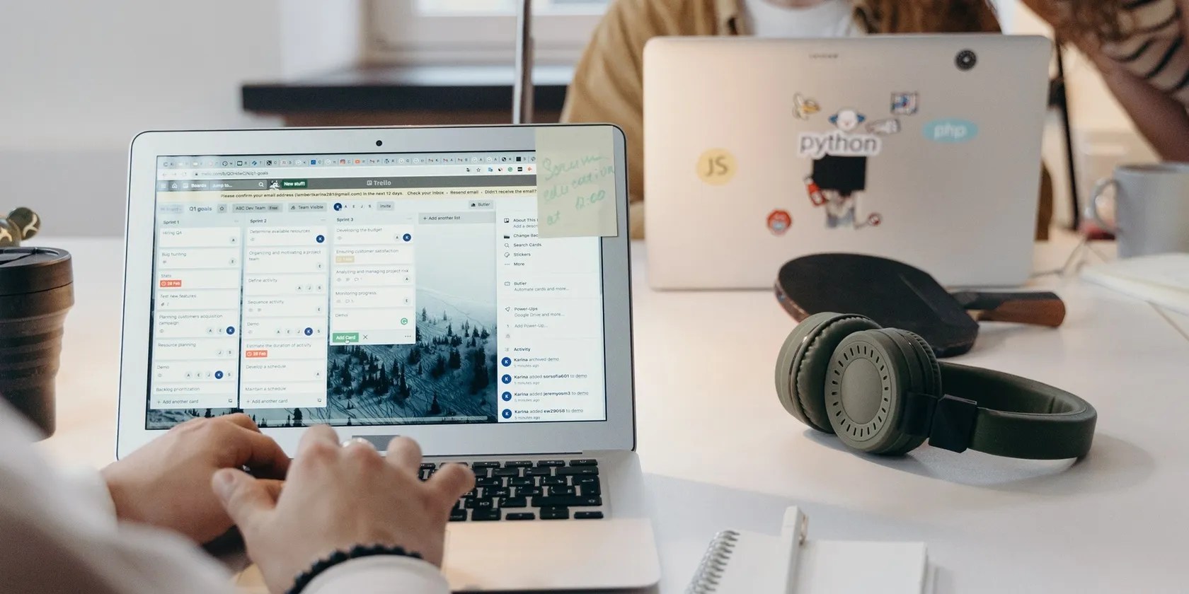 People working on laptops in office