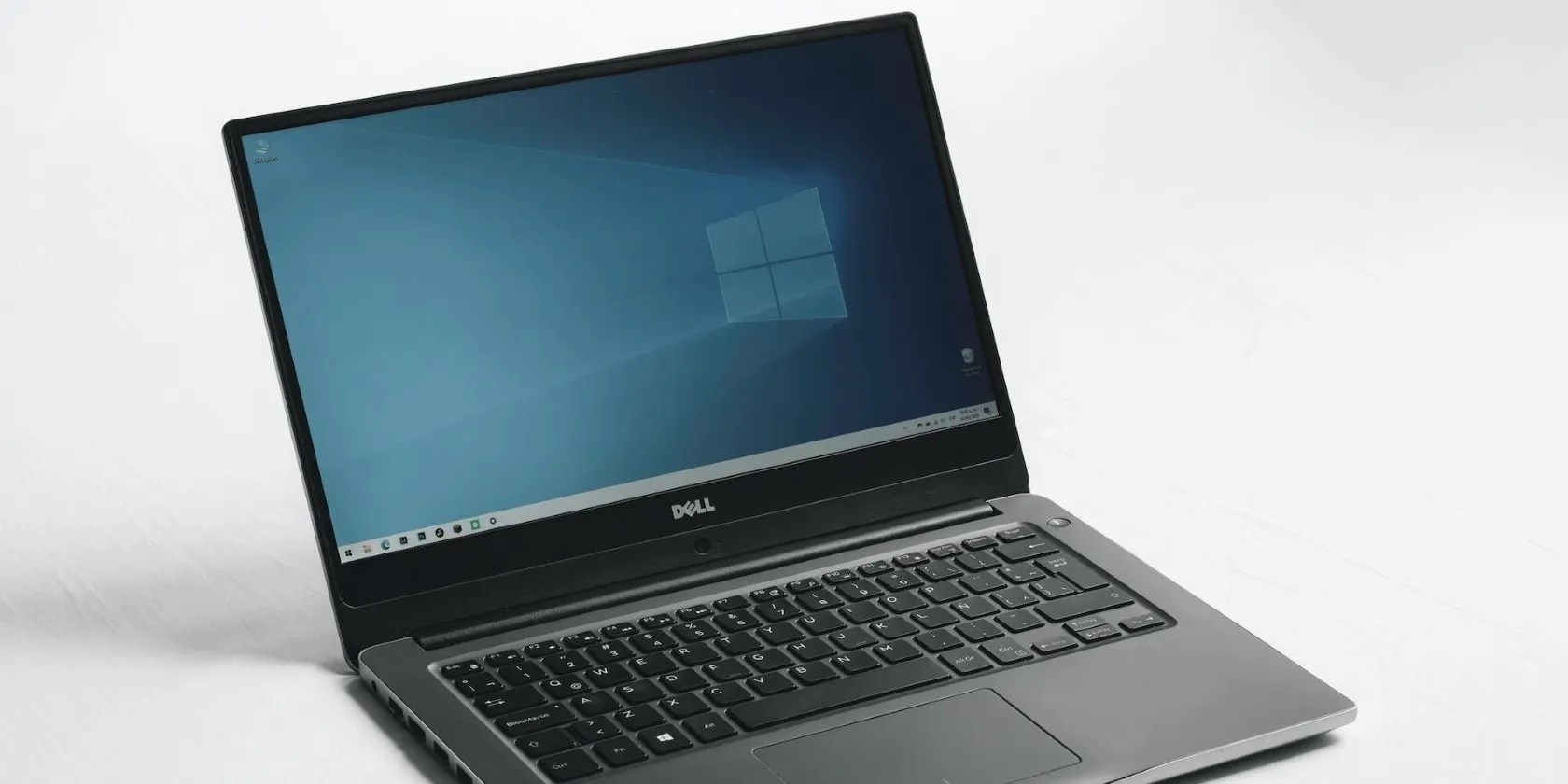 A Dell laptop on a white surface