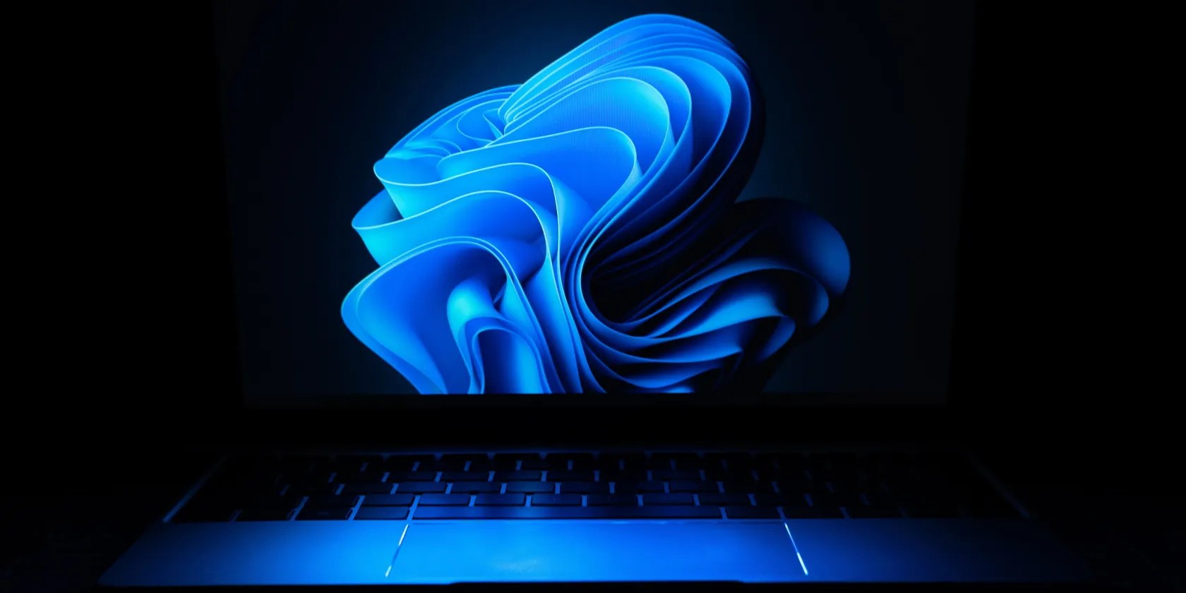 Bright Blue Windows Background on Laptop