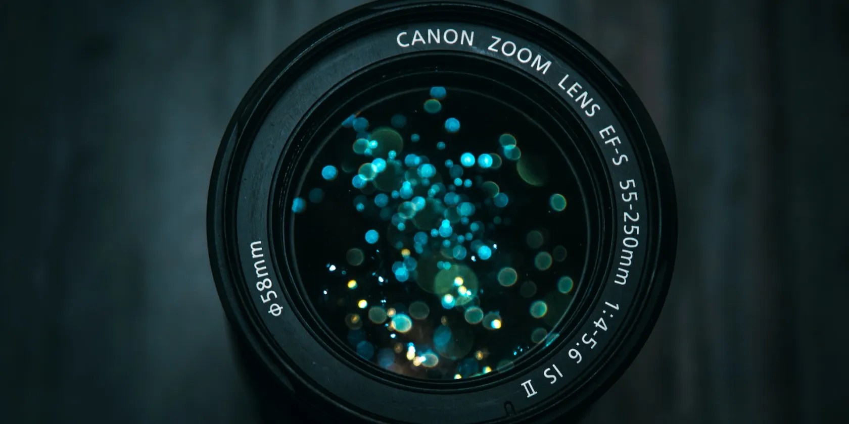 black canon dslr camera lens with flickers