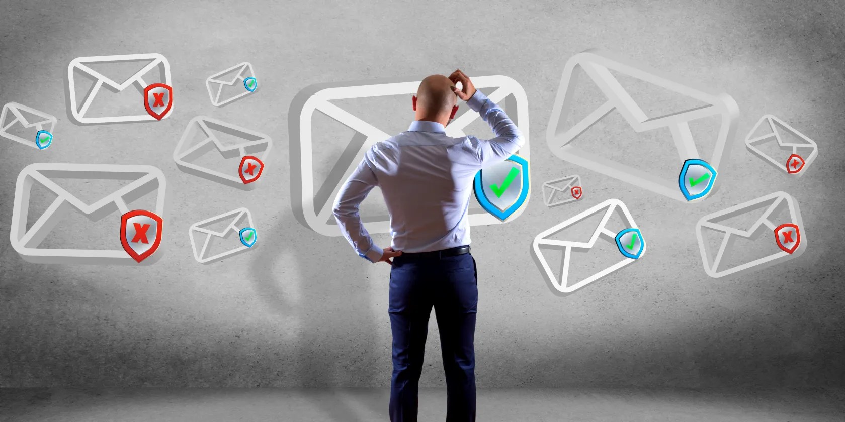 man scratching head in front of security emails feature