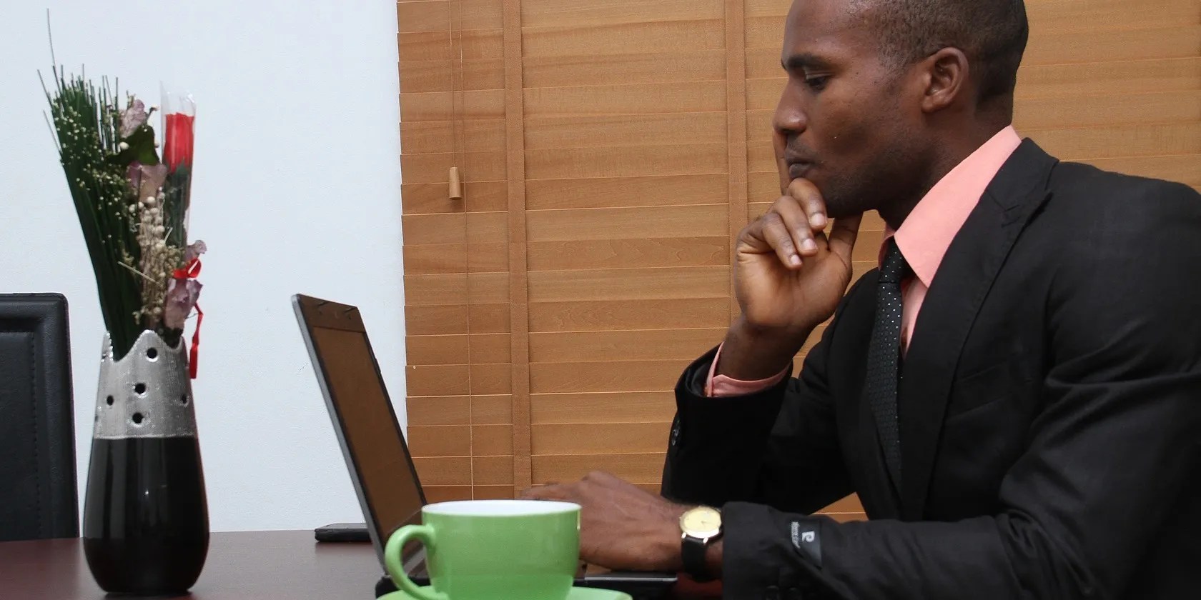 Man in Suit Working in the Office