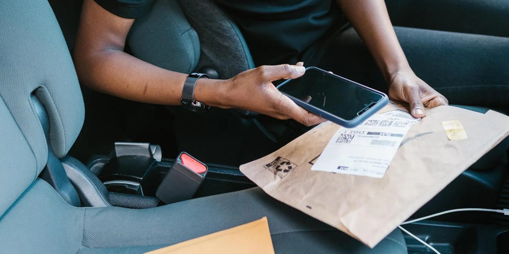 Woman taking photo of a document using a phone