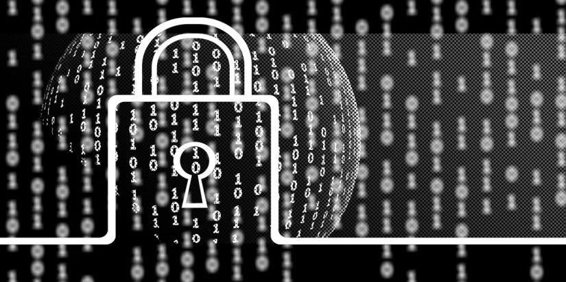 Binary code displayed on a screen with a padlock representing encryption.