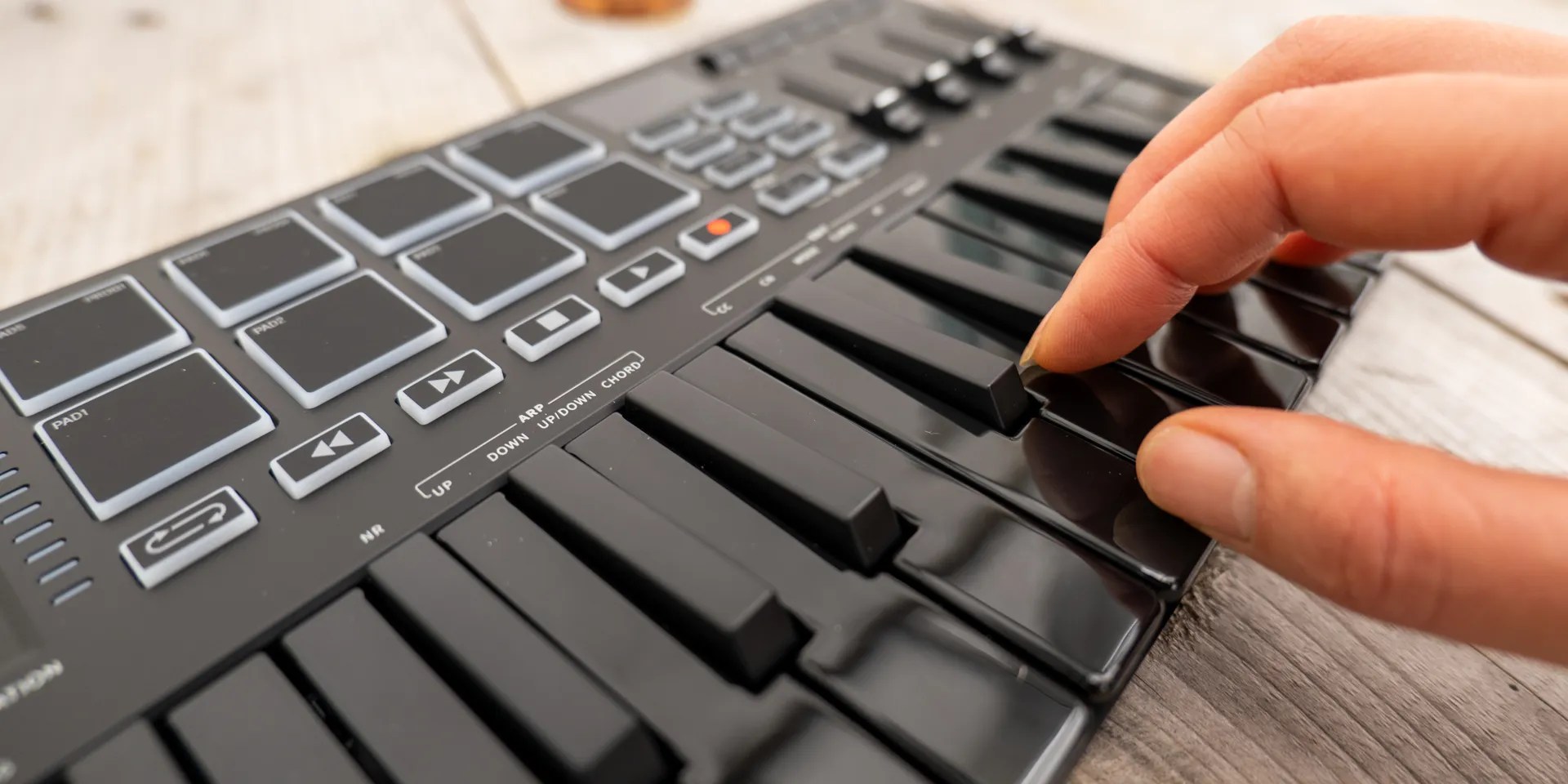 Donner DMK25 Pro Mini Midi Controller: Knobs, Sliders, Keys, and Pads