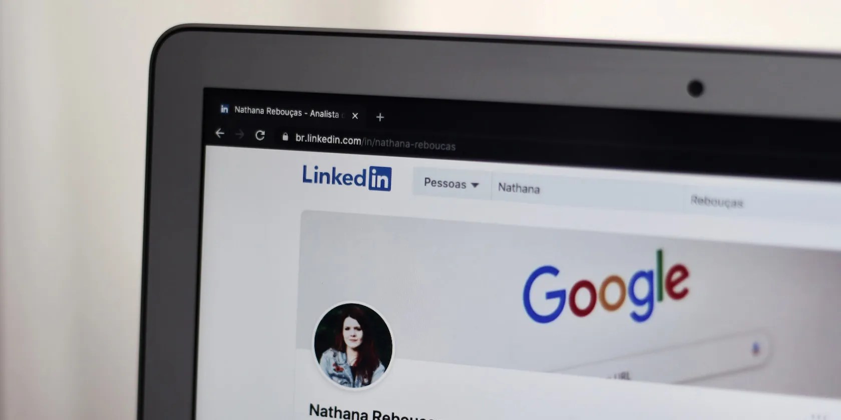 Laptop showing a LinkedIn profile