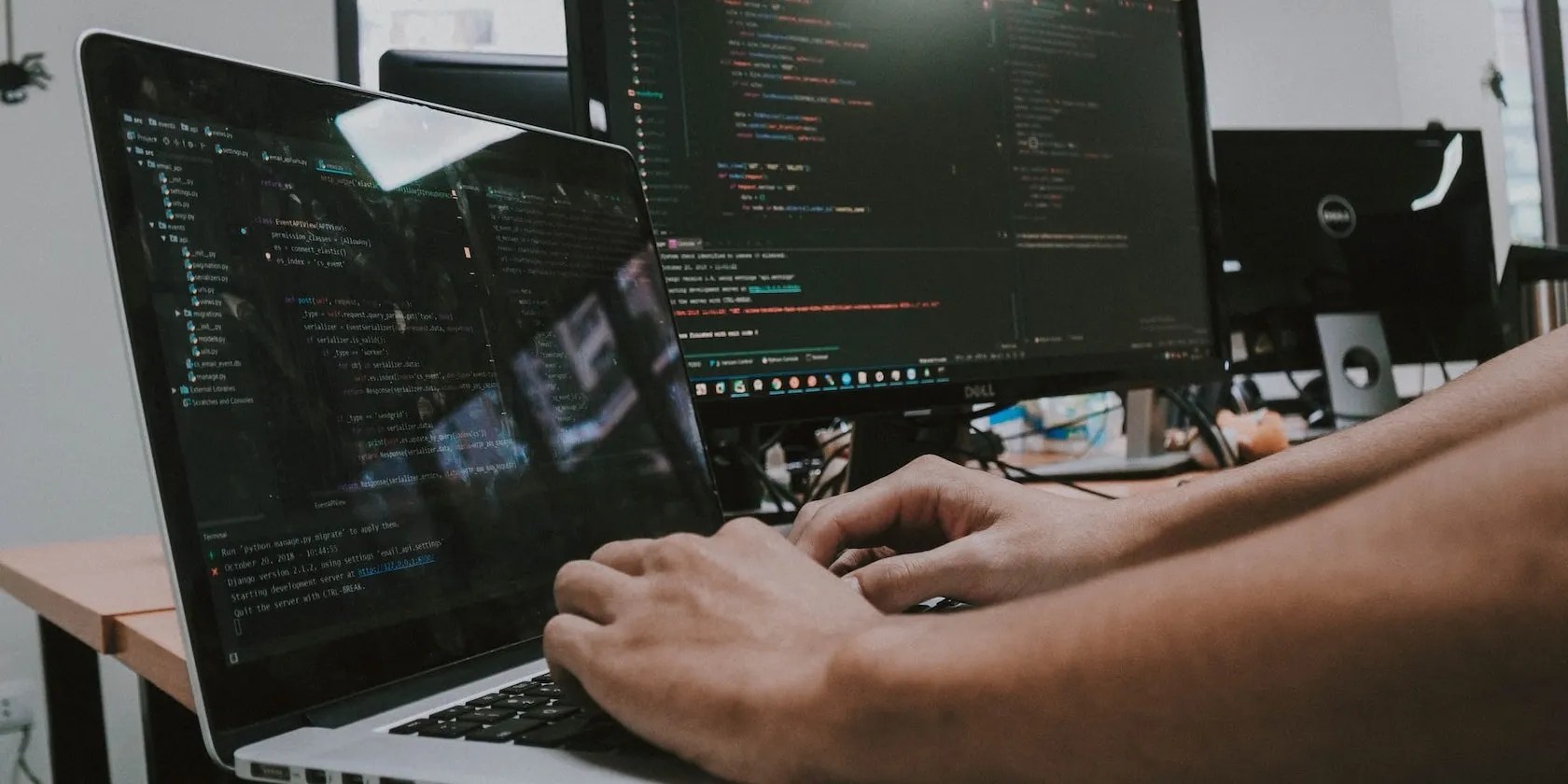 Man Typing on Computer