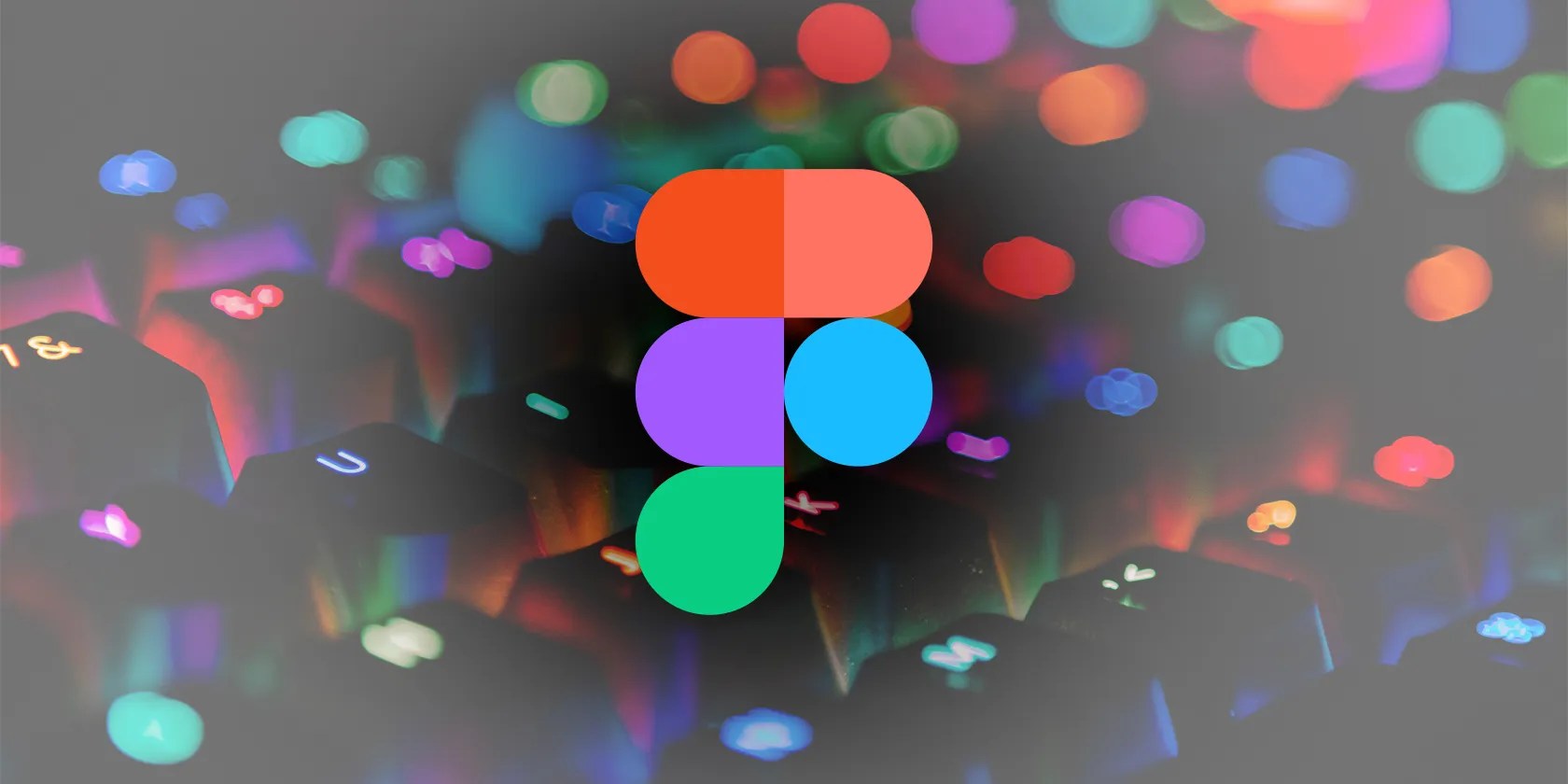 Colored keyboard background with Figma logo.