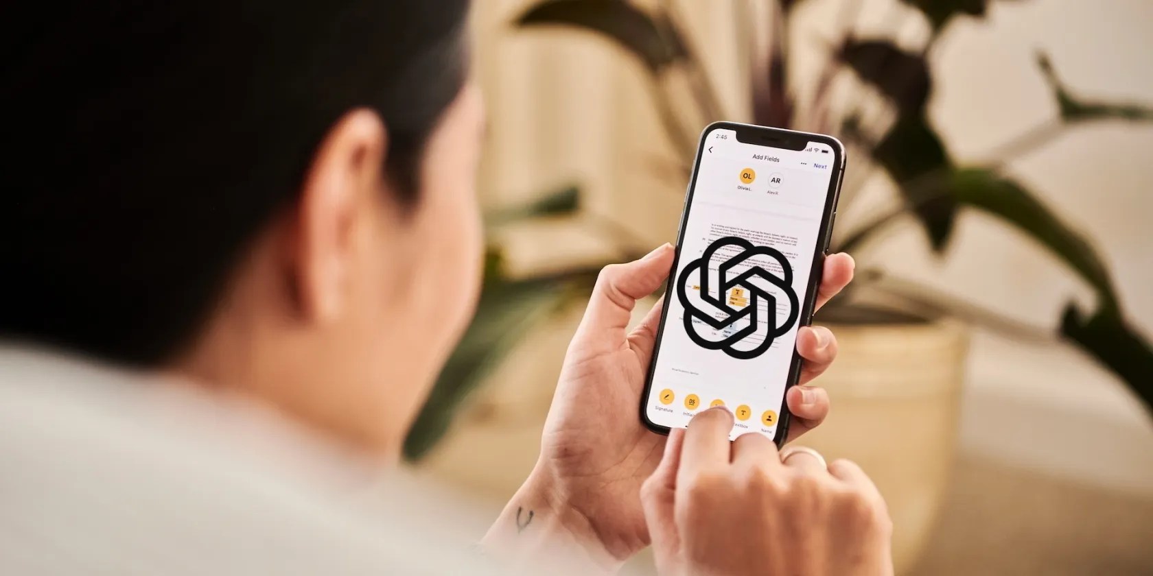 person using OpenAI app on an iPhone