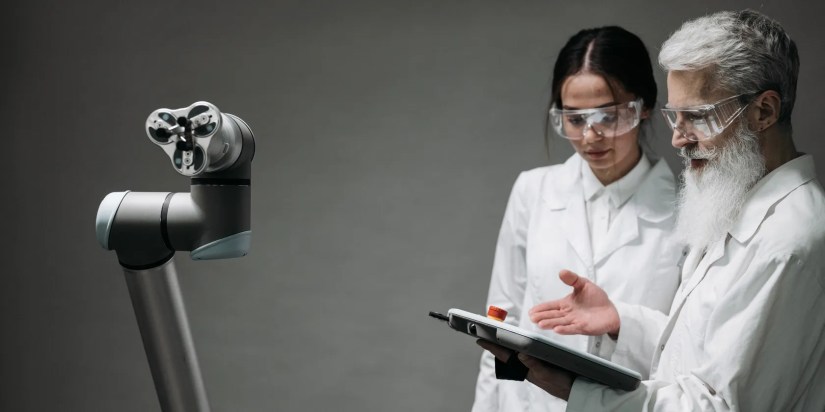 Analysts Analyzing and Testing an AI Robot