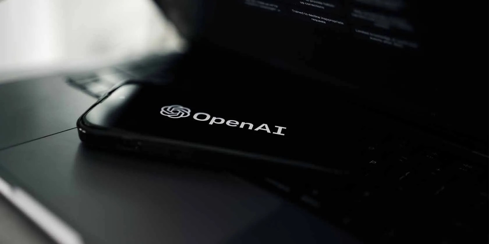 OpenAI logo up-close on a phone