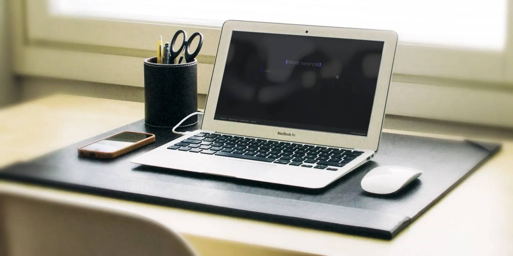 Mockup of a Laptop Showing a Browser Hijacked With TabSearch Hijacker