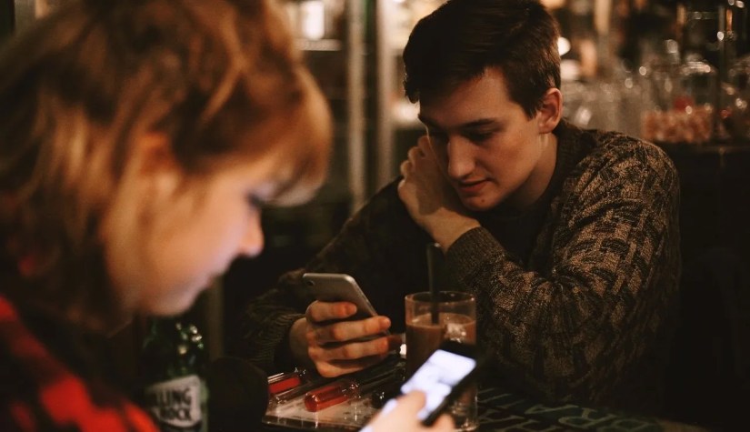 Man and Woman Texting