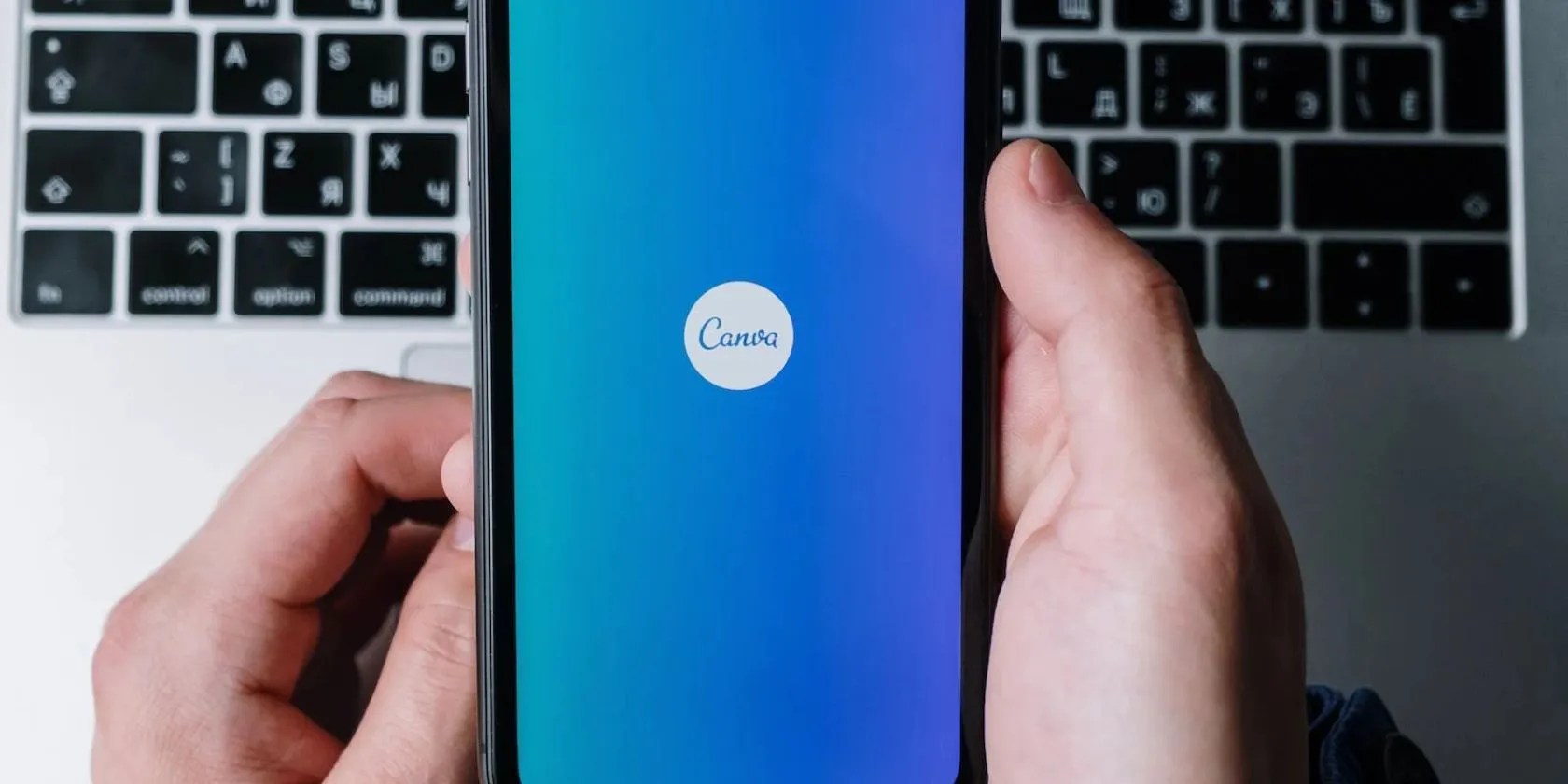 Person opening Canva on a smartphone