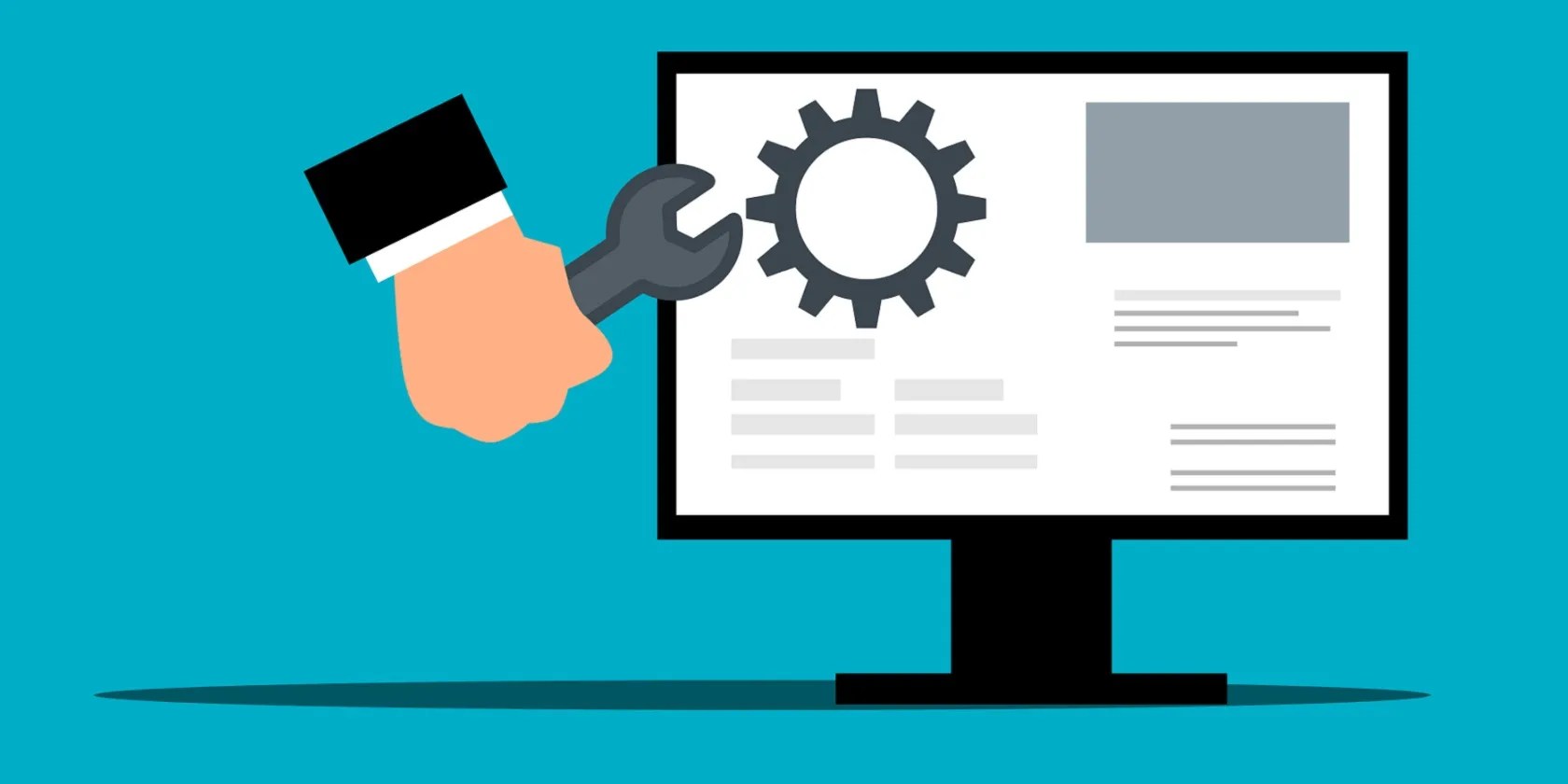 A computer monitor and wrench