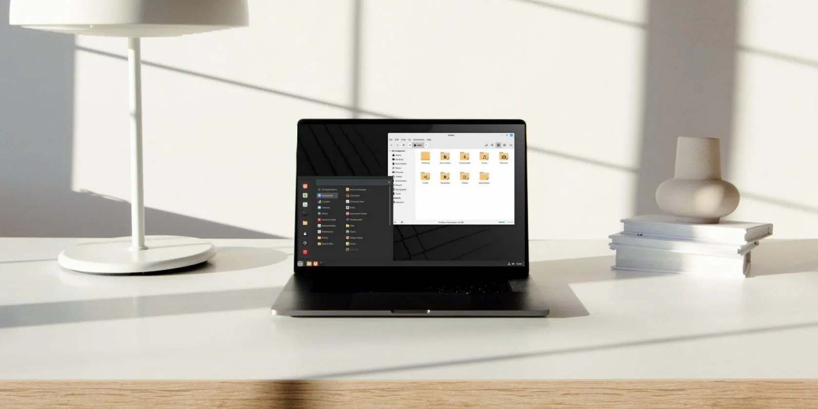 Laptop running Linux Mint sitting on a desk.