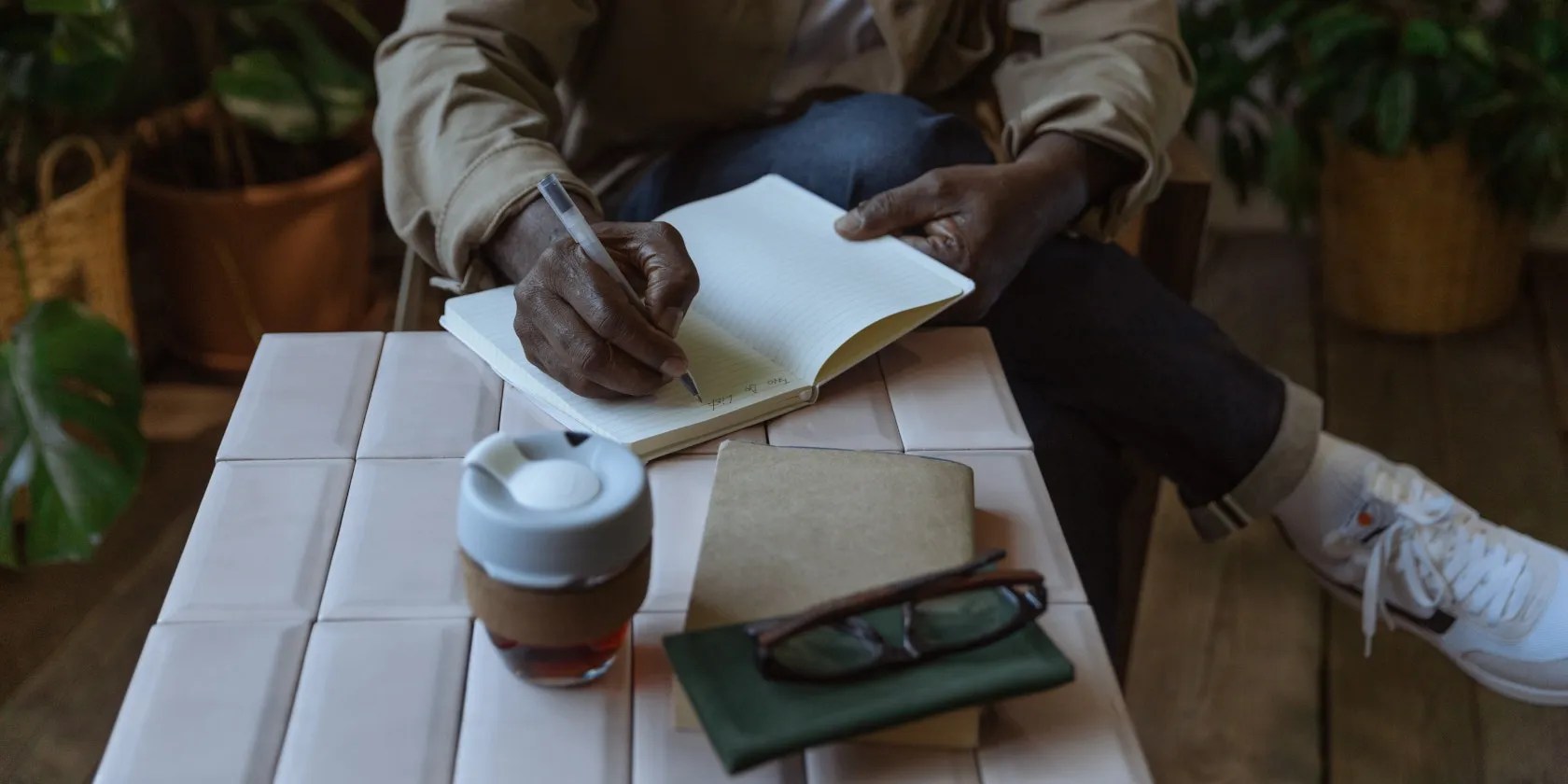Man writing in a notebook