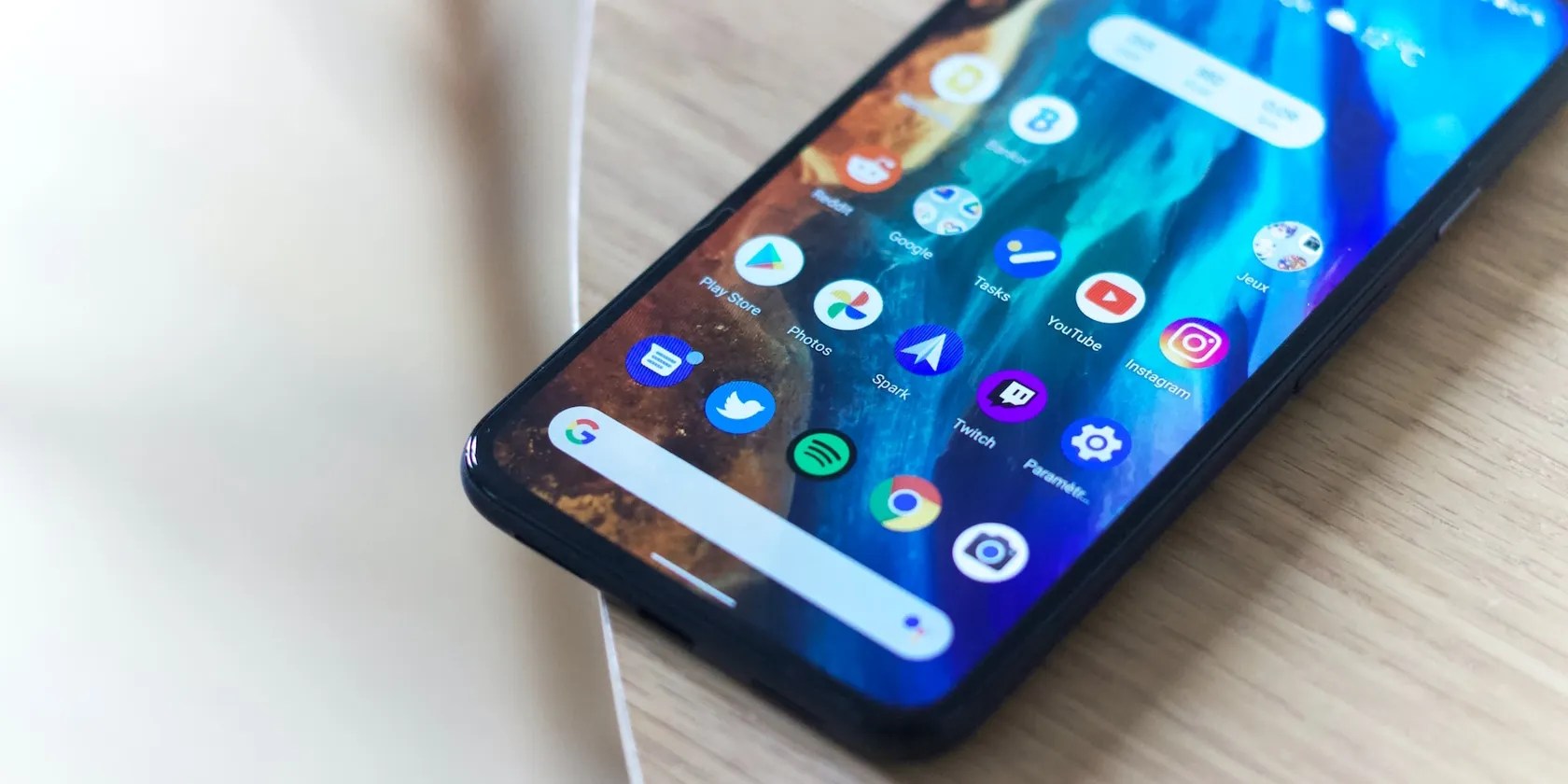 An android phone lying on a table showing gesture navigation