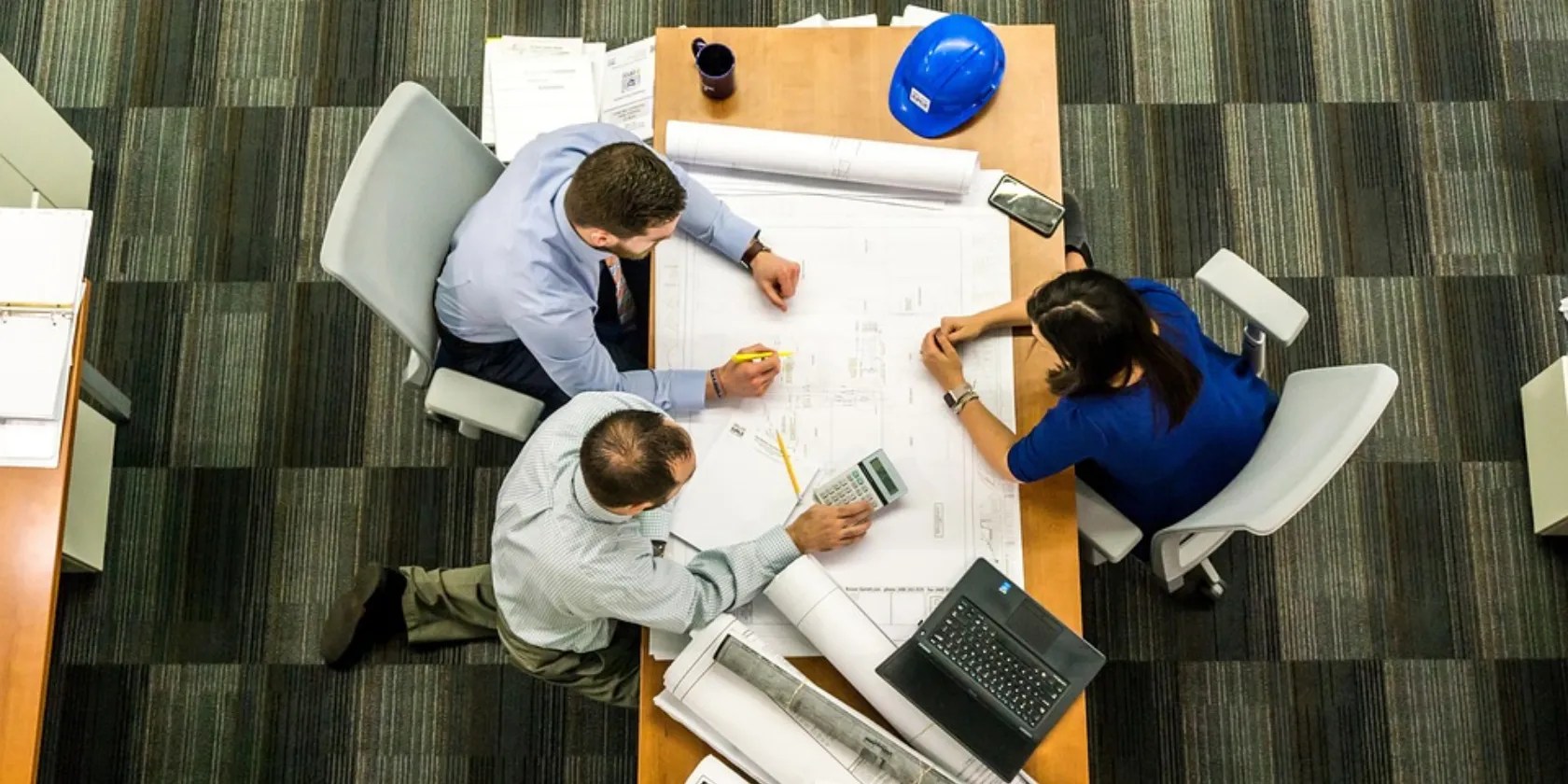 a group of people sitting and discussing