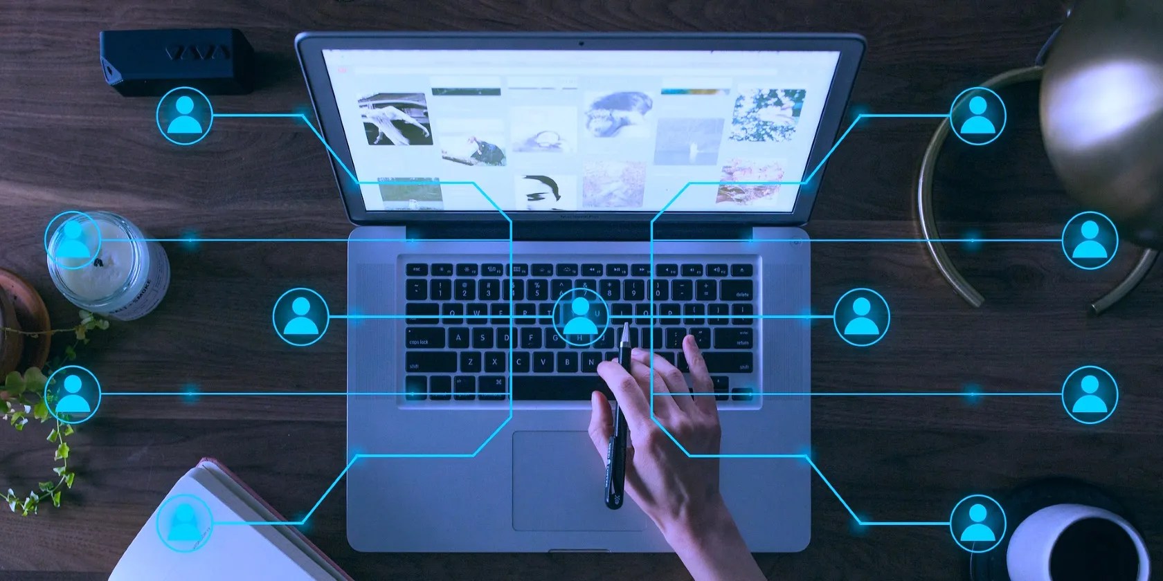 A person using a laptop with special effects in the foreground