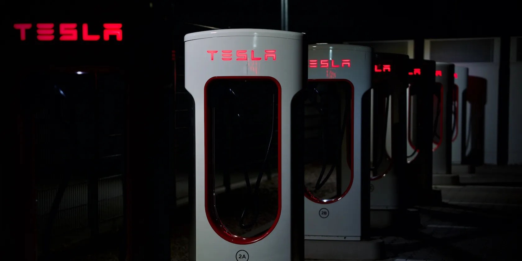 A row of Tesla Superchargers