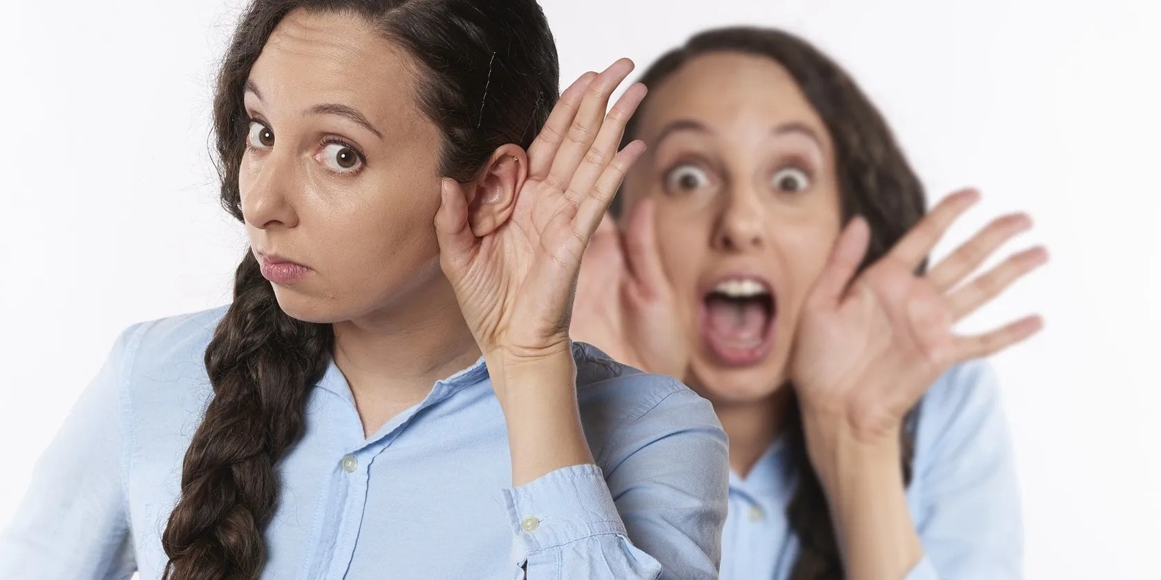 Two women, one listening, one shouting